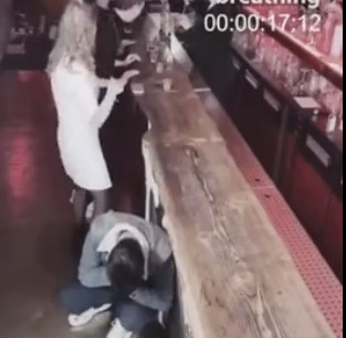 Man Choking to Death while his Wife Dances and does Shots at the Bar