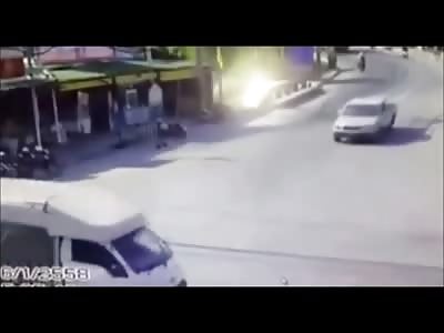 CCTV Caught Moment When Girl Riding Her Scooter is Crushed by Big Truck