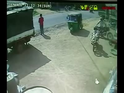 Watch the Lucky Man Escape From a Terrible Accident with a HUGE Truck