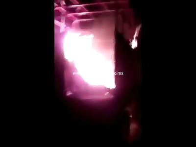 Short Video of a Man being Burned inside of a Cage for Stealing Cows 