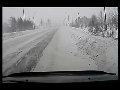 Woman Gets out to Check Damage of Her Car After Spinning out on an Icy Road ... What Happens Next is Horrifying