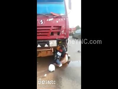 Biker Meets Trucks Wheel and Becomes One with It