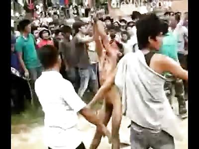 Man Tied by Hands in a Soccer Goal is Beaten to Death by Stick Blows