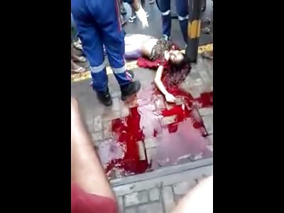 Woman Dead on the Street with a Leopard Bra Pouring a Pool of Blood