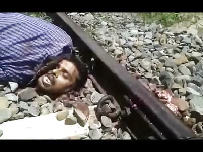 Man Lays Twisted on the Tracks After Committing Suicide by Train