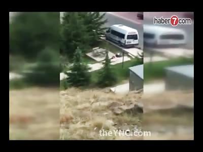 Video from a Distance shows a Man kill Himself with a Pistol after Argument with his Wife 