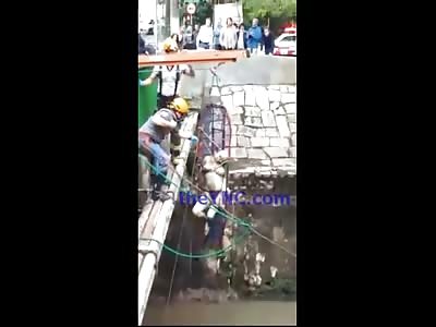 Creepy Video of Dead and Bloated Female Pulled from River with a Pulley 