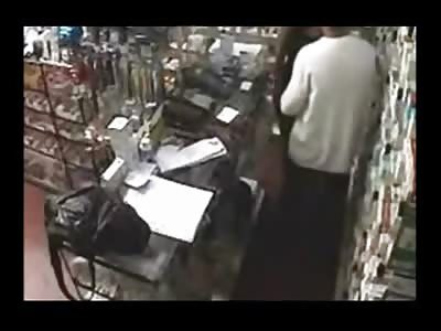 Security Camera catches Employee getting a Blowjob Behind the Counter 