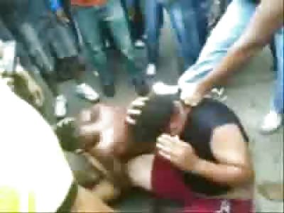 Kids Who Stole are Beaten by a Mob in the Stree