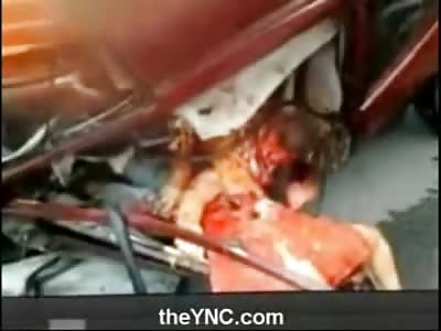 Silently Screaming Man hangs Half out of Car Ripped in Half by his Seat Belt 