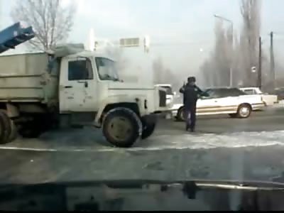 The Invincible Police Man: Ran Down by Huge Truck .... Gets up and Continues Directing Traffic