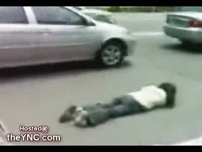 Suicidal Woman in China hits a Car instead of the Pavement