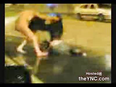 Drunk Girl loses her  Towel during a Fight with her  Friend in the Street