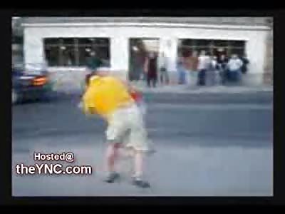 Man starting a Fight gets a BRUTAL Beating on the Street (Graphic)