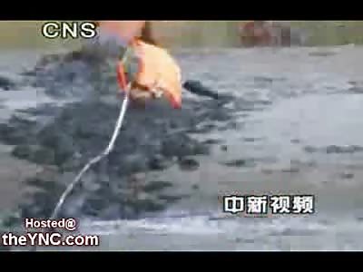 Suicidal Woman in China who Attempted Suicide into a River of.....Mud