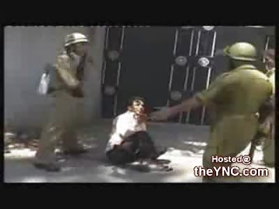Protestor in Kashmir is Brutally Beaten by every Guard on the Force