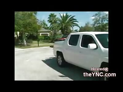 Complete and Total Moron in back of a Truck Falls out Cracks Skull