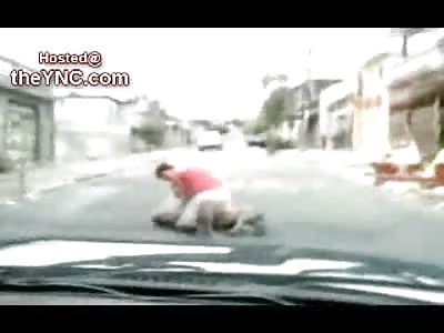 Roadblock: Guy Beating his Girl Stops Traffic in Brazil