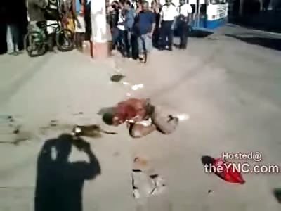 Brutally Beaten and Smoldering Man is Set on Fire by Maniacal Mob