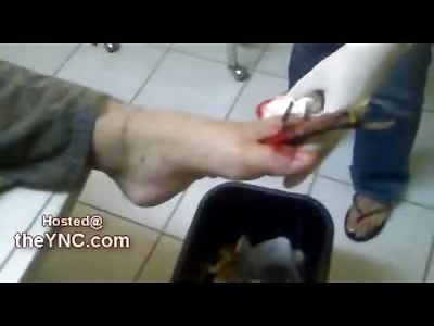 A Very Pretty Nurse tries Really Hard to get a Large Stick out of Mans Foot