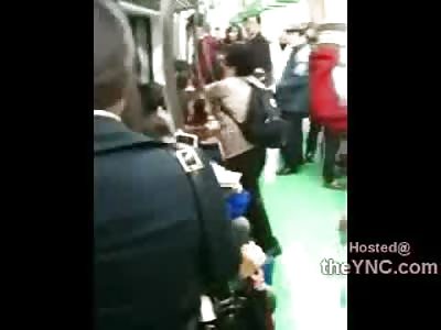 The Hell is This? 40 Year Old Chinese Woman Fights Little Girl on Subway as Everyone just Watches