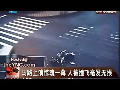 You LUCKY Bastard!! Man in China does Triple Flip over Truck and Lives to Walk it Off