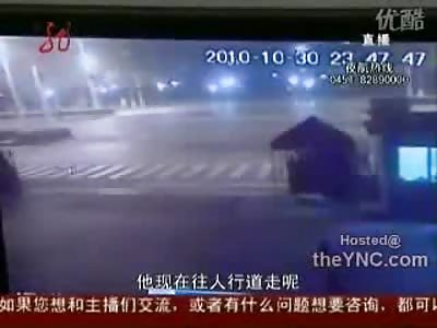 Crazy..Man not Paying Attention is Launched by Car changing Directions Mid Air (10/30/2010..China)