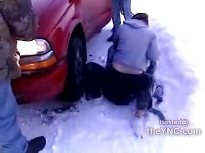 Girl Whacks her Head on Bumper of Car as she Gets her Ass Beat in the Snow 