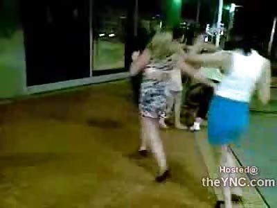 Gang of White Girls takes on Gang of African Girls, Girl tries Bashing Female on Hood of Car