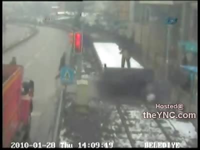 Man Attempts and Fails to outrun a Flatbed Train...