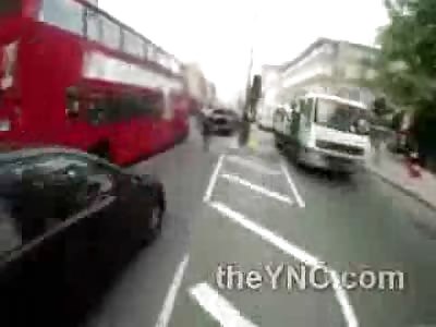 WHoa: Crazy Cyclist on the Busy Street nearly Crushed to Death by Bus