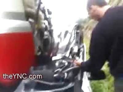 He's in There?...Man and his Car Completely Crushed by Large Gasoline Truck