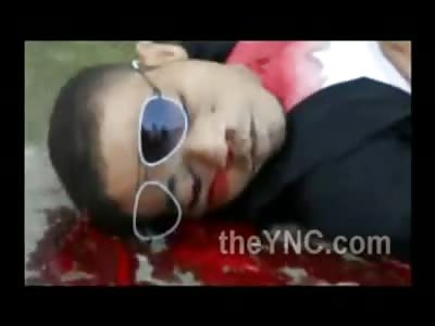 Mr Cool Dies With his Shades on......Shot In the Left Eye....Bleeds out in Front of Crowd