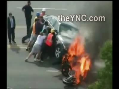 Group Effort: Crowd Tips Car To Rescue Motorcyclist Trapped Underneath About to Burn Alive