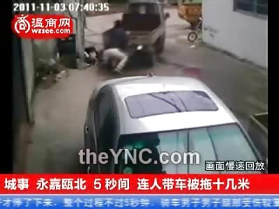 WHOA: Poor Kid on a Bicycle Gets Plowed by a Truck and Taken for a Ride
