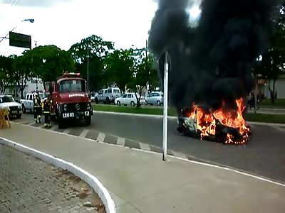 Men on the Road Moaning as Car Burns 