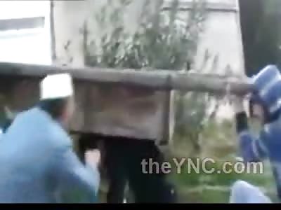 Bizarre: Mans Coffin is Dragged by Rope to a Funeral under Heavy Sniper Fire...WOW