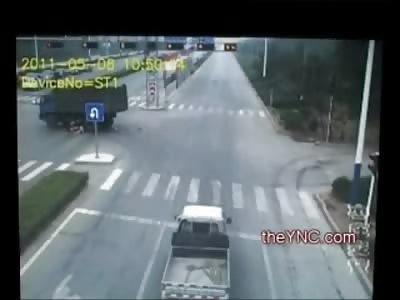 Scooter Riding Couple vs Dump Truck