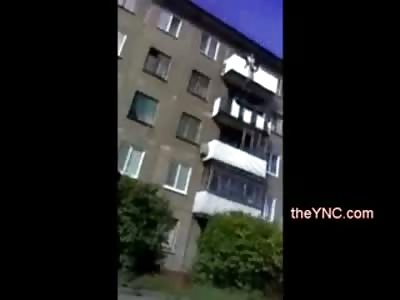 Idiot Son Dangles from Apt Balcony and Cant Hold On as his Parents try to Save Him