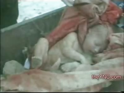 File Footage of Murdered Bloody Baby pulled out of a Dumpster
