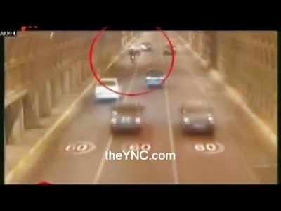 Motorcyclist in a Tunnel Falls off his Bike and then Run Over by Cars