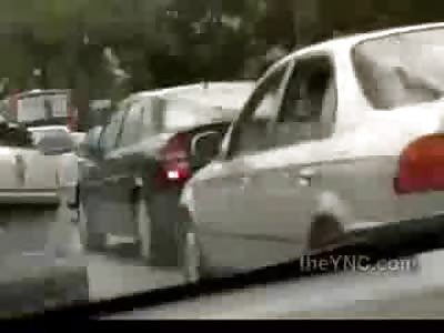 LMFAO: Woman Runs Crazy Biker over Like a Boss after he Kicks Her Car