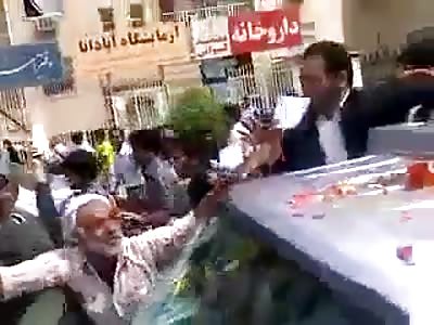 AWESOME: Girl Jumps on Iranian Presidents Vehicle and Regulates on his Dumb ass Like a Boss