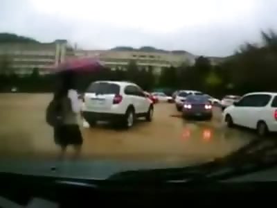 Poor Girl with an Umbrella meets the Bad Bad Woman Driver