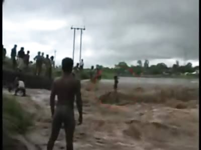 Rescue goes Wrong as Young Boy is Swept away in Violent Flood Waters