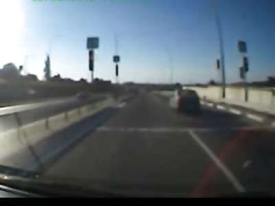 Motorcyclist Does a Twirl After Crashing in Car