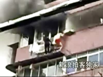 Deranged Woman Jumps off Building after Setting Her Home on Fire... Boyfriend Watches in his Boxers
