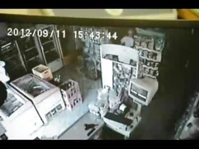 Female Store Owner surprises Thug robbing her Store and is Shot dead in the Face (Watch Slow Motion) 