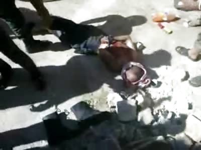 Dying Man is Dragged like a Dog and Kicked in the Head by Soldiers
