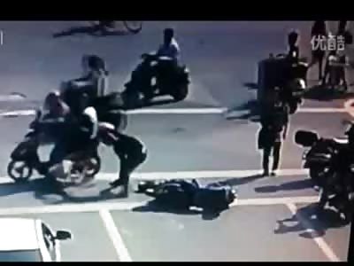 Guy Attacks Girl after Scooter Accident and Then Gets Attacked by Pissed off Pedestrians
